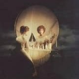 A skull?  Or a woman looking into a vanity mirror?
