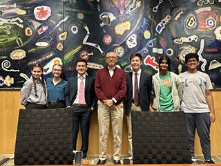 Rick Woychik with group of students