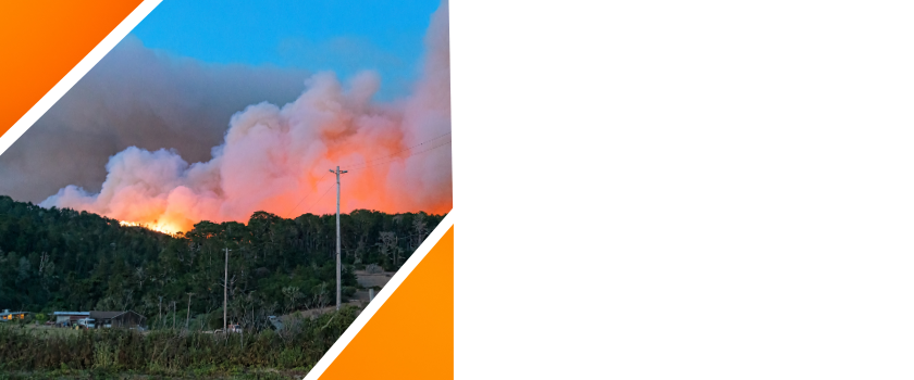 Photo of a burning wildfire on a hill