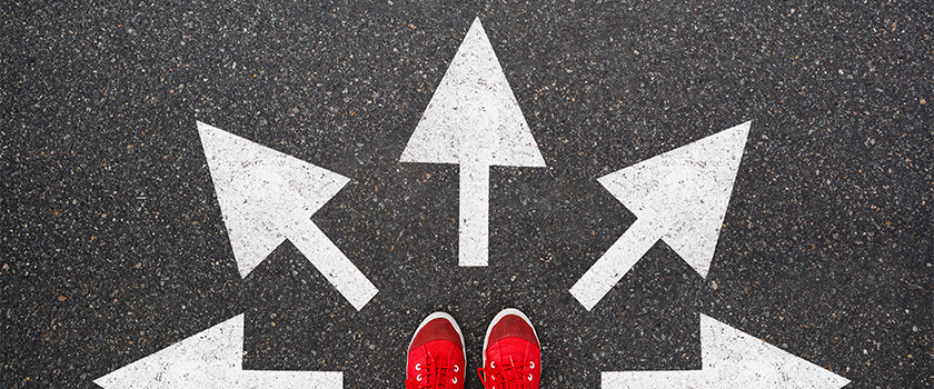 feet with arrows painted on the ground