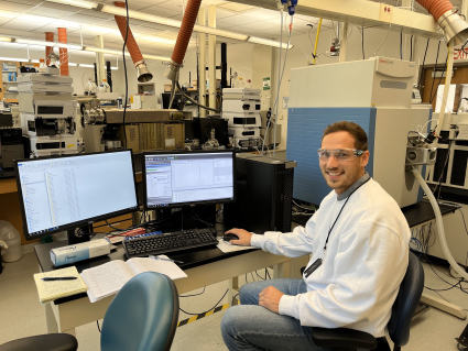 Photo of Jarod Snook sitting at a desk