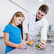 scientist and child in lab