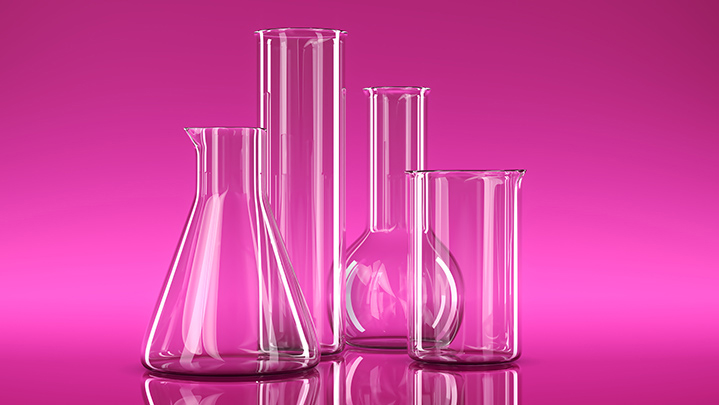 Set of transparent glass chemical laboratory flasks and beakers