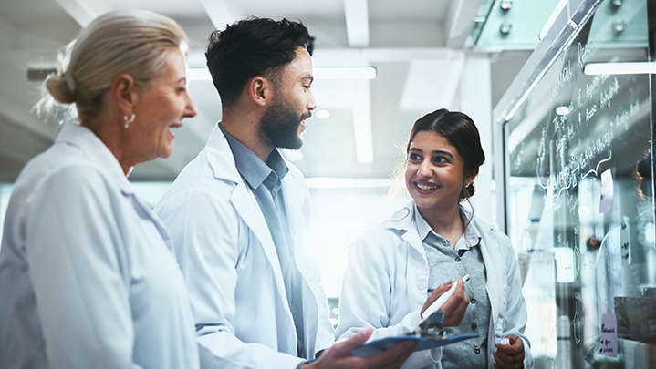 Meeting, glass wall and team of scientists in lab