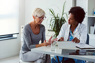 Female patient visiting doctor