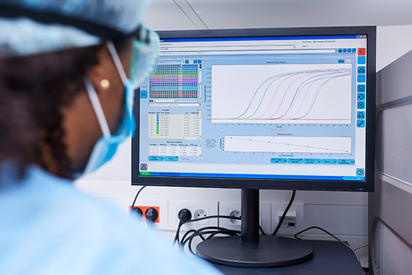 Scientist looking at the monitor