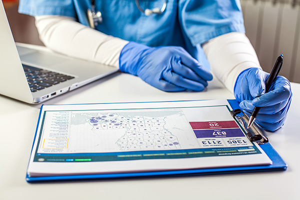 Scientist looking at the charts