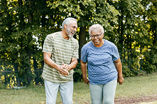 Older couple laughing with each other