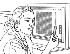 A female scientist uses a computer to study tiny parts of cells