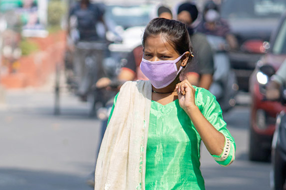 a woman wearing a face mask