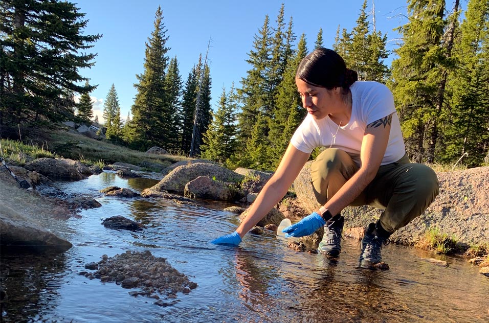 JoRee LaFrance works in the Little Bighorn River