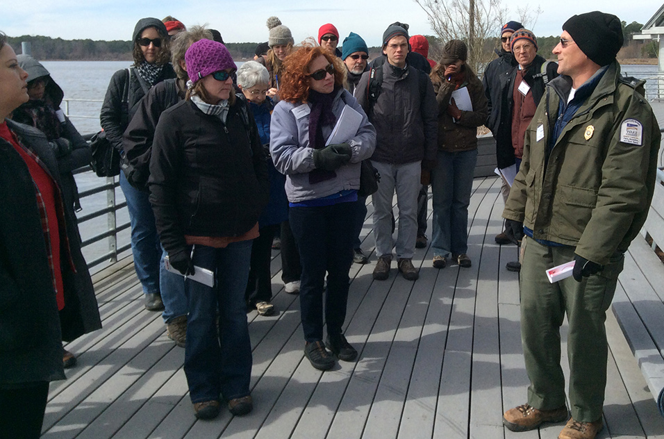 Lake Crabtree County Park Manager Drew Cade talks to reporters