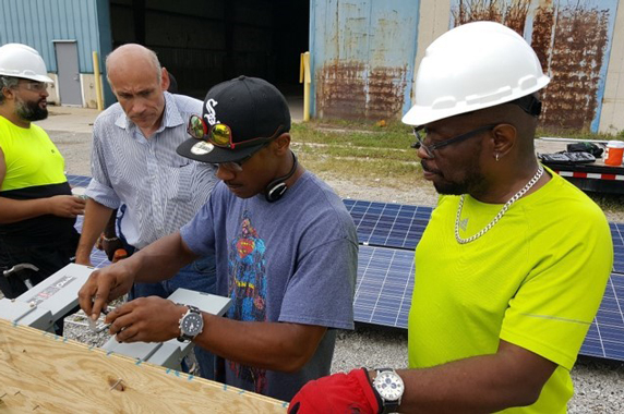 ECWTP trainees in Chicago learn how to install solar panels