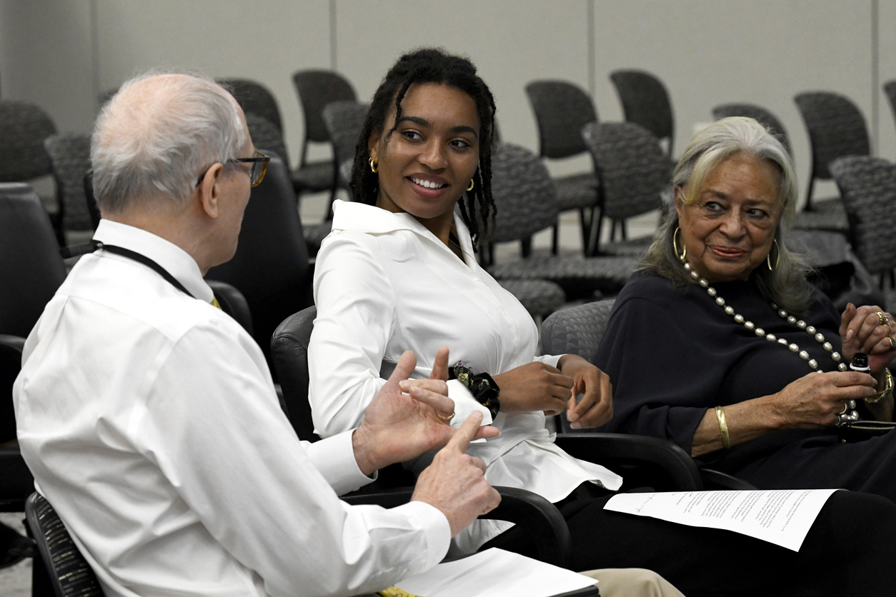NIEHS Director, Rick Woychik, Ph.D., chats with Granger and Pinn at the 2023 Spirit Lecture, held as a hybrid event on Zoom and in person at the Rodbell Auditorium on the NIEHS campus in North Carolina. (Photo courtesy of David Iversen / NIEHS)