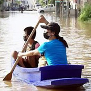 Woman and child in a rowboat