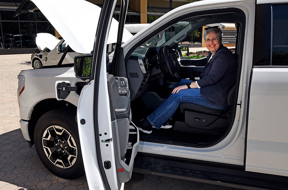 Kerri Hartung sits in the F150 Lightning electric pickup