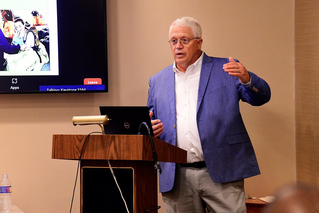 Kenneth Oldfield at podium