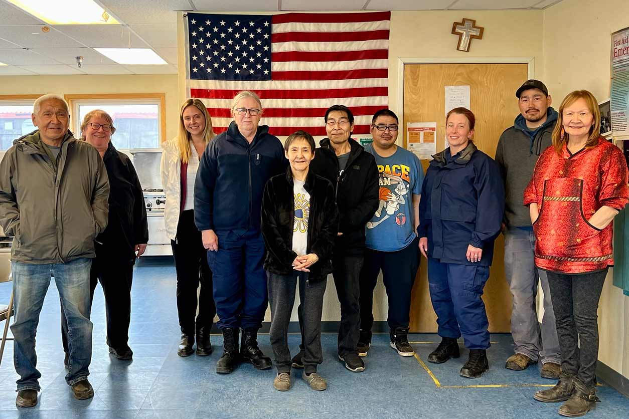Pamela Miller, second from left, Viola “Vi” Waghiyi, environmental health and justice program director for ACAT, far right, and members of the Native Village of Savoonga shared contamination and climate concerns with Adm. Levine Aug.7. (Photo courtesy of Kim Seigfreid / HHS).