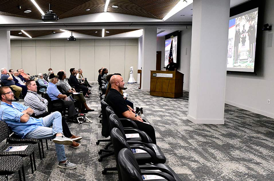 Attendees watched a slideshow documenting Darrell Hixson’s travels with the U.S. Army.