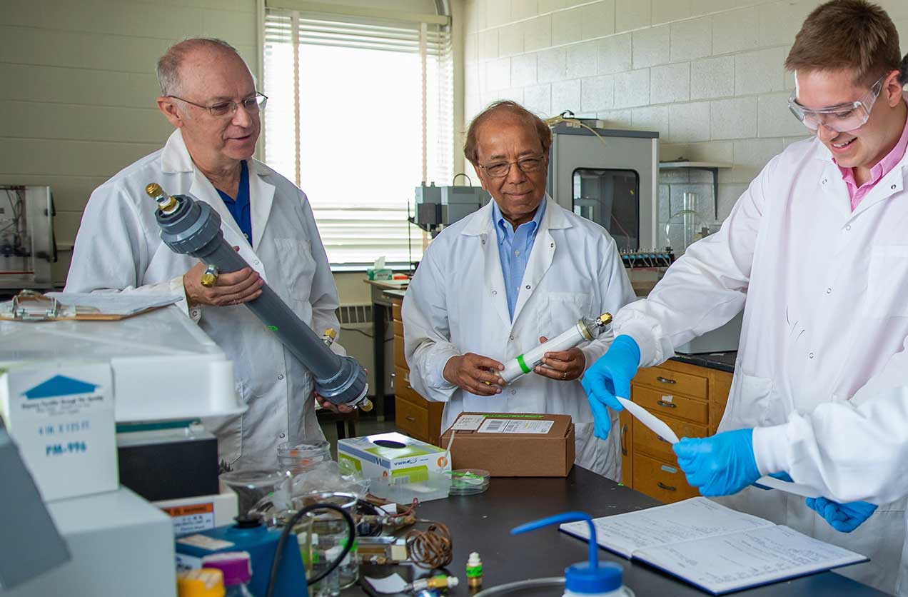 Rollie Mills, right, Dibakar Bhattacharyya, Ph.D., center, and Lindell Ormsbee, Ph.D, left.