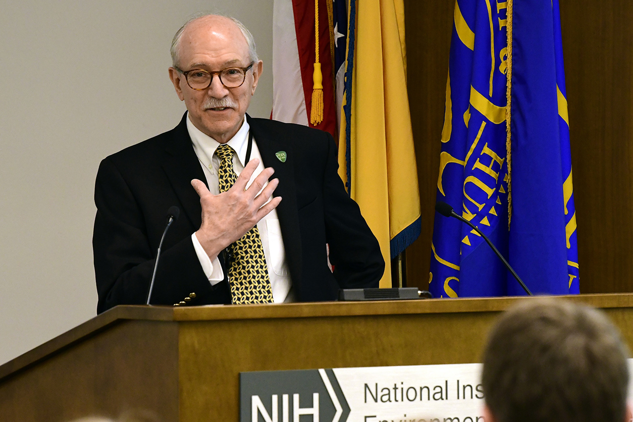 Rick Woychik, Ph.D. speaking in front of an audience