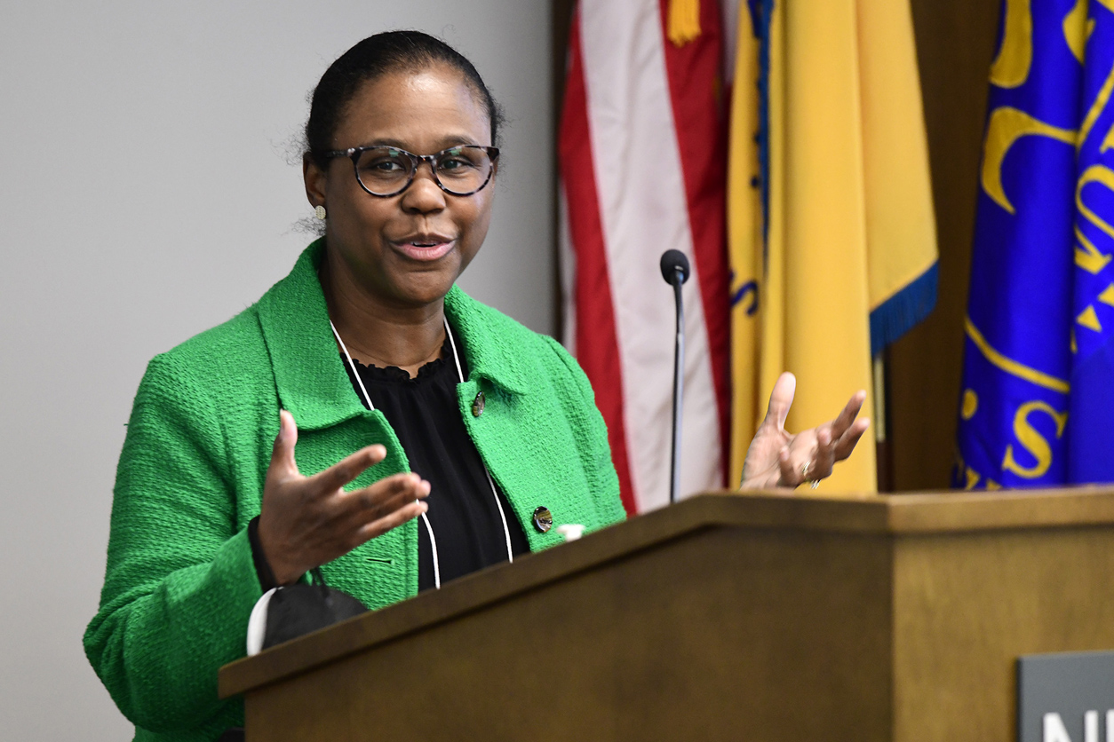 Tamarra James-Todd, Ph.D. speaking in front of an audience