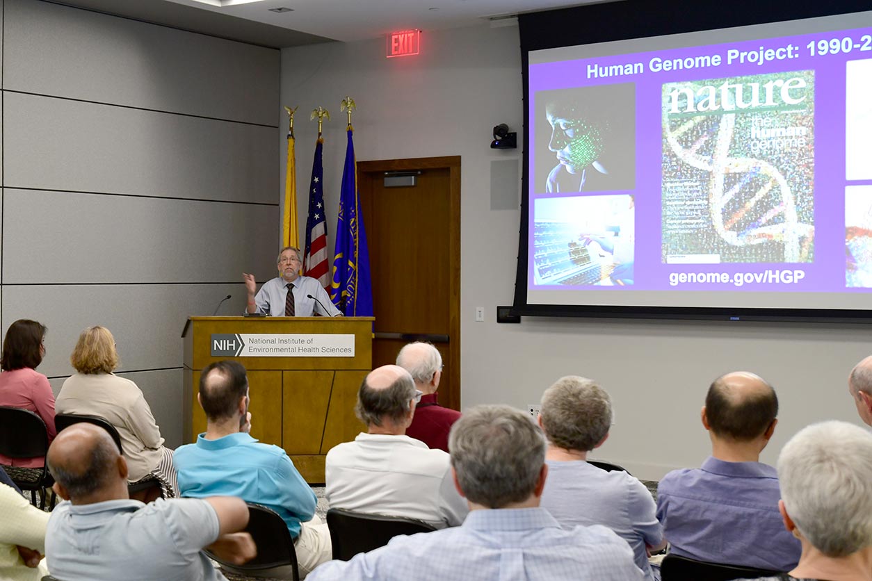 Eric Green, M.D., Ph.D., speaks to the audience