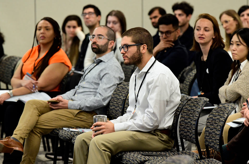 Attendees listened intently and raised questions about hiring practices at different types of biomedical companies.