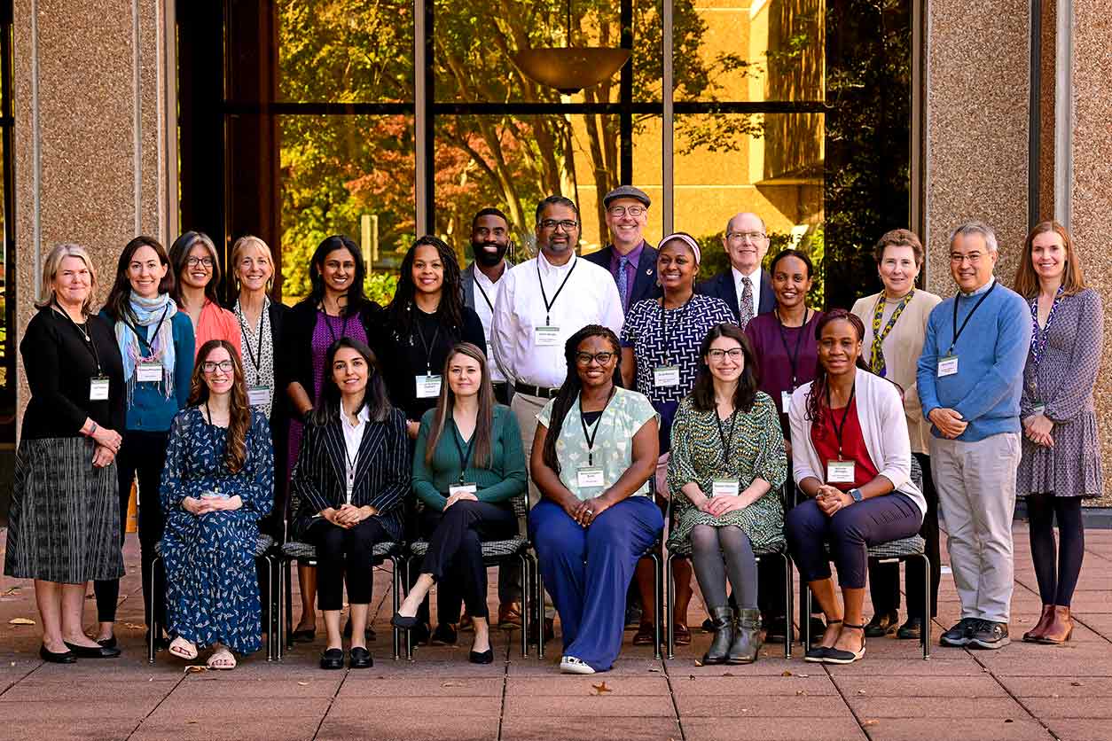 Mary Crocker, M.D., seated center left, gathered with other PREHS scholars in North Carolina for the 2023 retreat. (Photo courtesy of Steve McCaw / NIEHS)