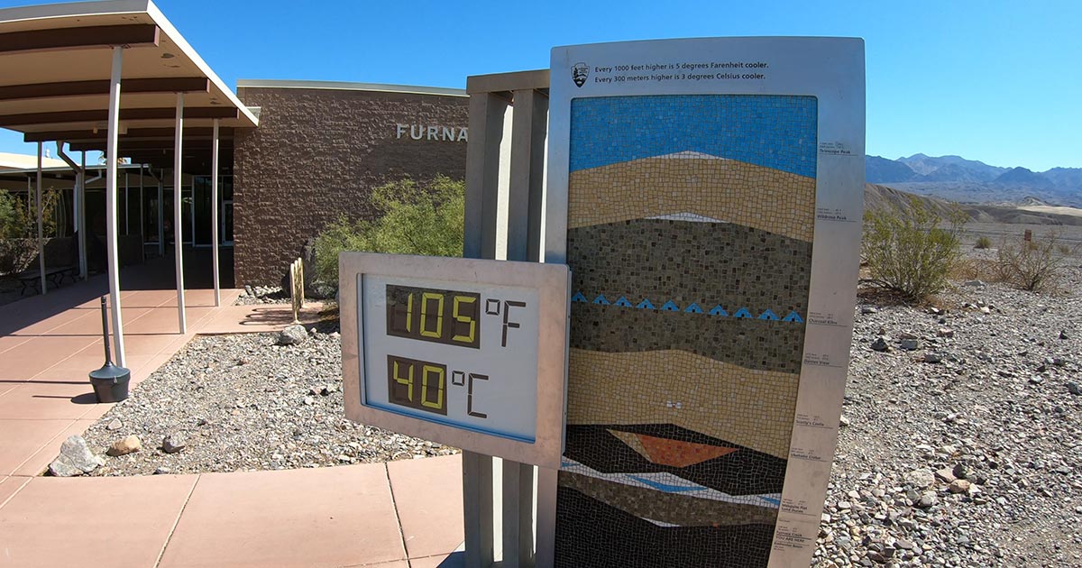 Furnace Creek, California, USA, June 26, 2022: Dual Fahrenheit and Celsius thermometer display at Furnace Creek Visitor Center in Death Valley National 