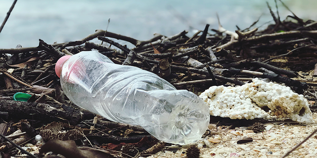 empty plastic bottle left at the beach