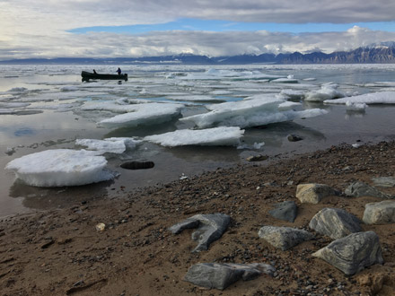 beach with ice and rocks