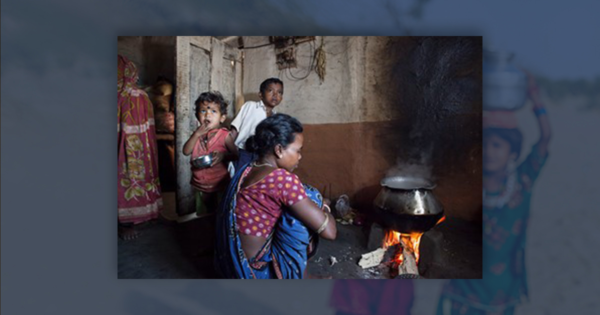 children around an indoor, unvented fireplace