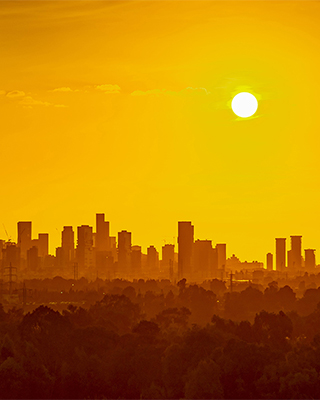 orange sky over a city skyline