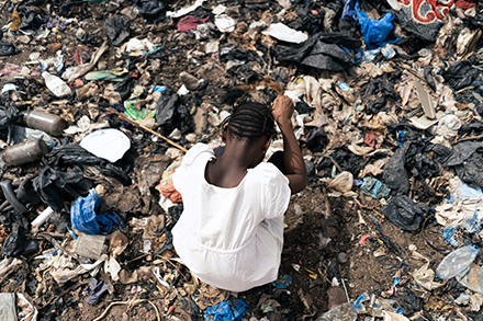 person walking through waste