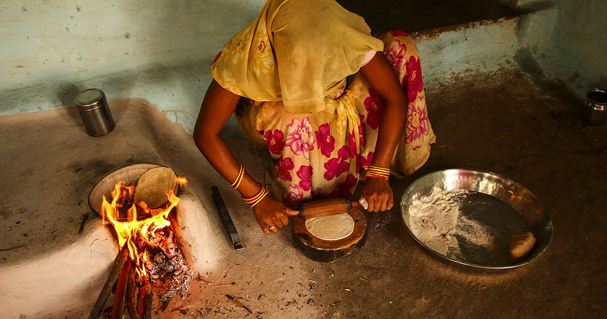 cooking food on an open fire