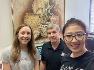 Two TAMU SRP trainees with Timothy Phillips, Ph.D.