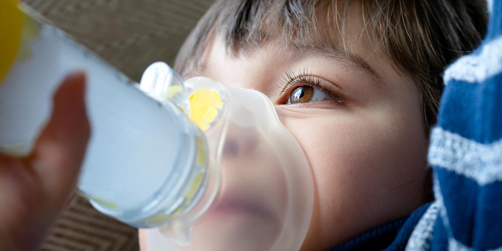 child using inhaler