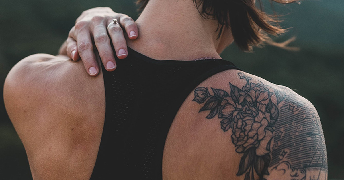 woman's back with a tattoo