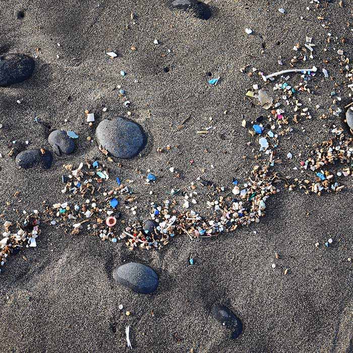 plastic particles in the sand