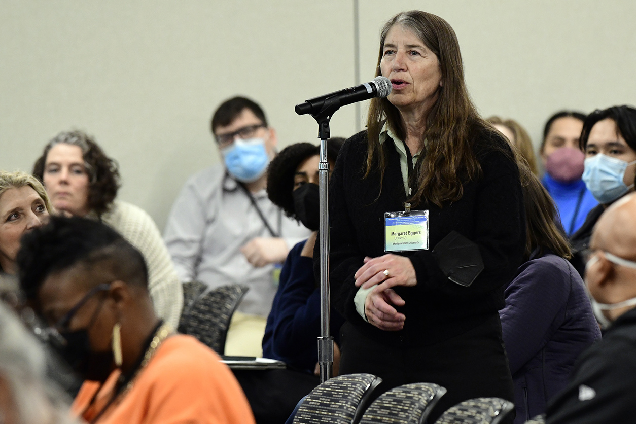 Margaret Eggers, Ph.D. speaking in front of an audience