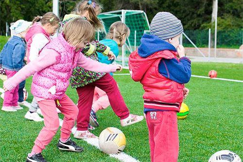children playing soccer