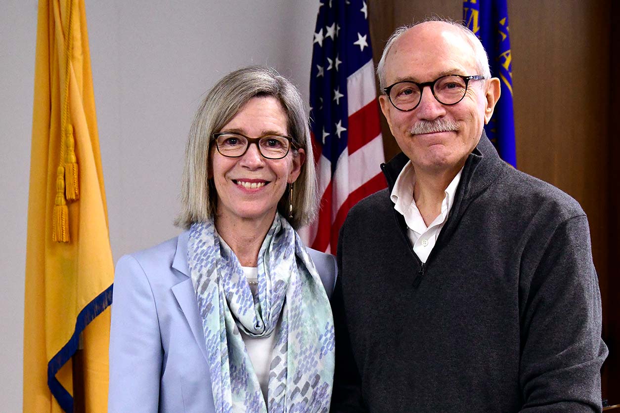 Lindsey A. Criswell, M.D., M.P.H., D.Sc., left, and Rick Woychik, Ph.D., right