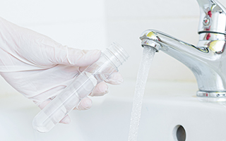 Filling test tube with water from faucet