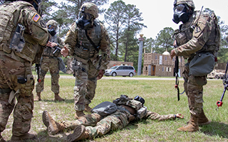 U.S. Army National Guard wearing gas masks