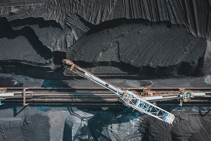 Machinery inside a coal pile