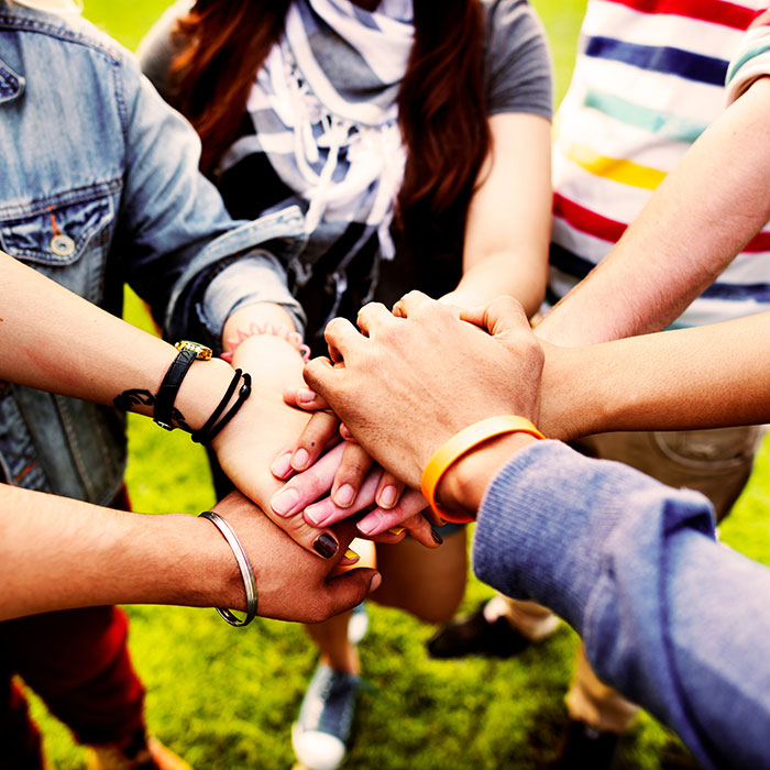 hands gathered in teamwork