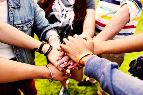 hands gathered in teamwork