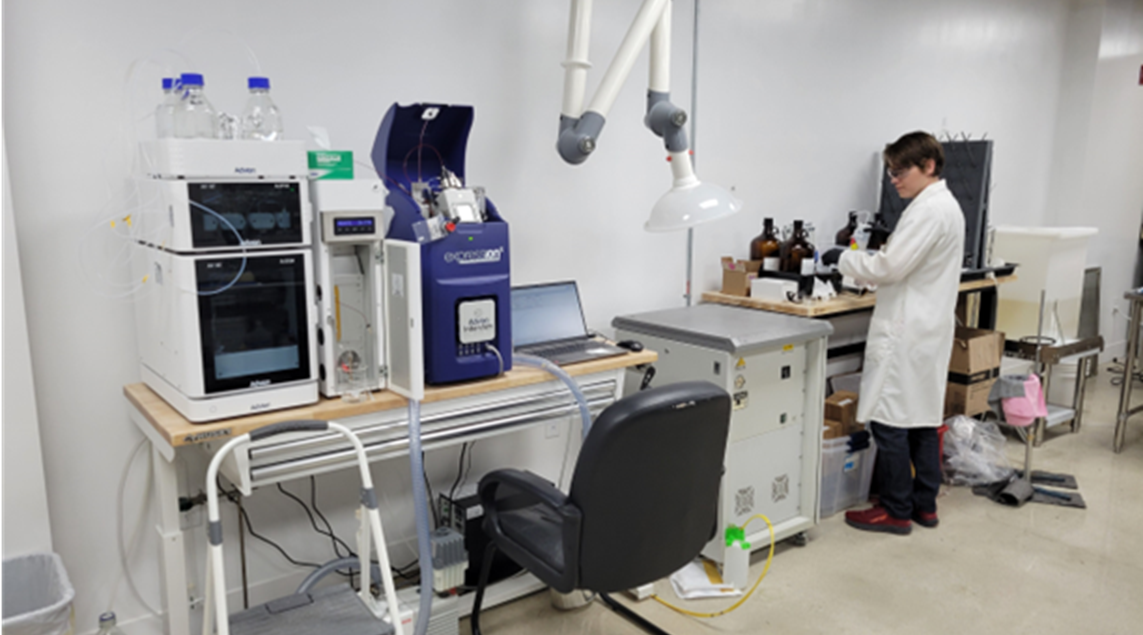 A chemist working with GlycoSurf lab equipment