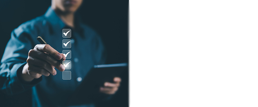 Man marking checkboxes on the screen